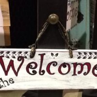 Sign Post with Welcome Sign